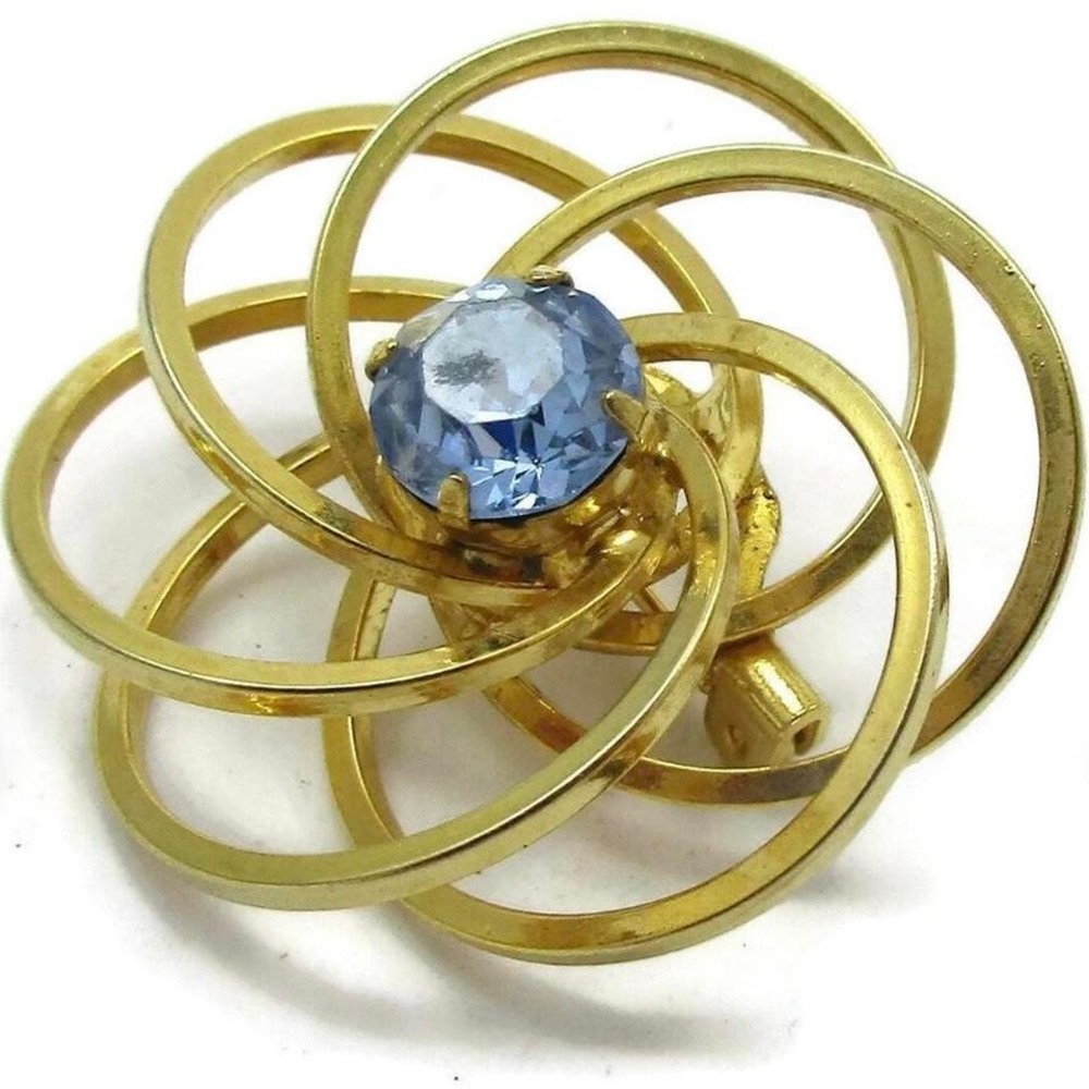 Vintage Gold Tone Interlocking Circle Flower Brooch Light Blue Rhinestone Center